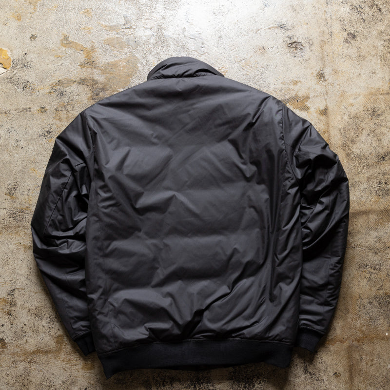 Embodying Functional Beauty: The "Elevated" Padded Jacket (Takumu AR Jacket)