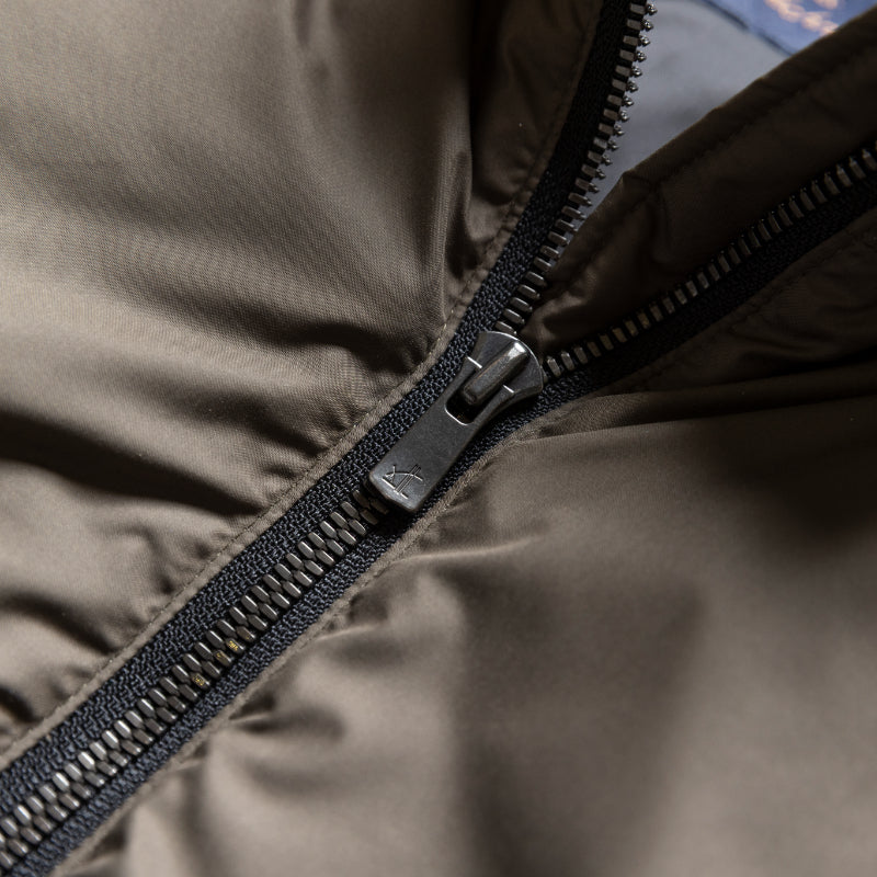 Embodying Functional Beauty: The "Elevated" Padded Jacket (Takumu AR Jacket)