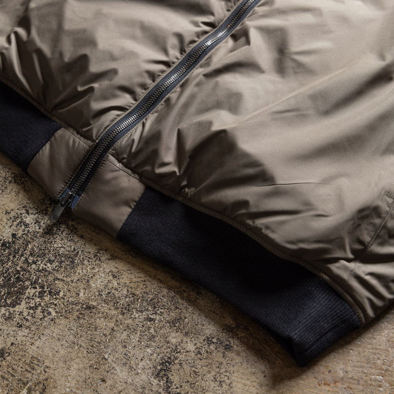 Embodying Functional Beauty: The "Elevated" Padded Jacket (Takumu AR Jacket)
