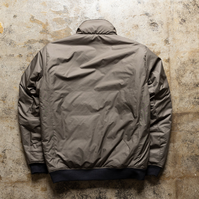 Embodying Functional Beauty: The "Elevated" Padded Jacket (Takumu AR Jacket)