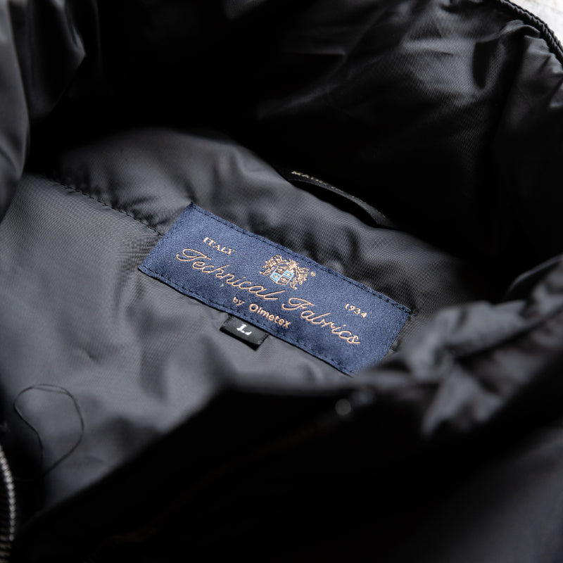 Embodying Functional Beauty: The "Elevated" Padded Jacket (Takumu AR Jacket)