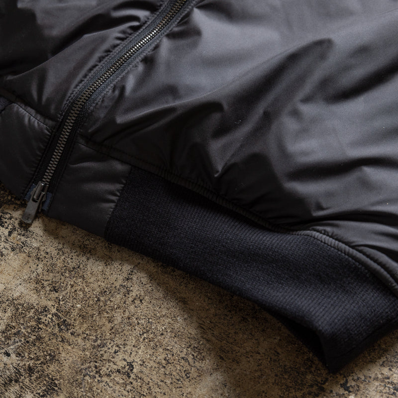 Embodying Functional Beauty: The "Elevated" Padded Jacket (Takumu AR Jacket)