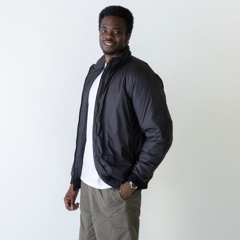 Embodying Functional Beauty: The "Elevated" Padded Jacket (Takumu AR Jacket)